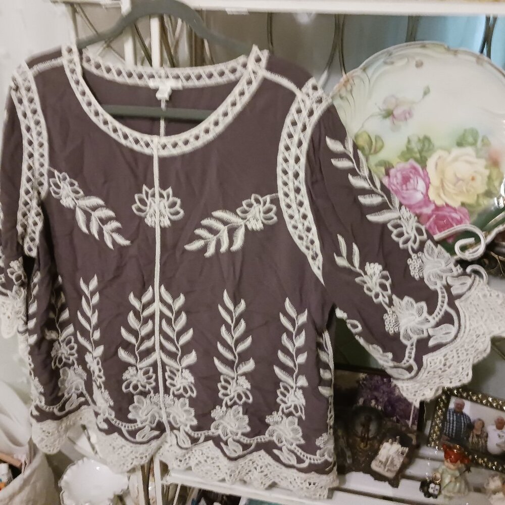 Casual Top with delicate embroidery accents